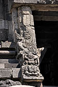 Prambanan - Candi Lara Jonggrang, makara figure as dwarapala at foot of the door 